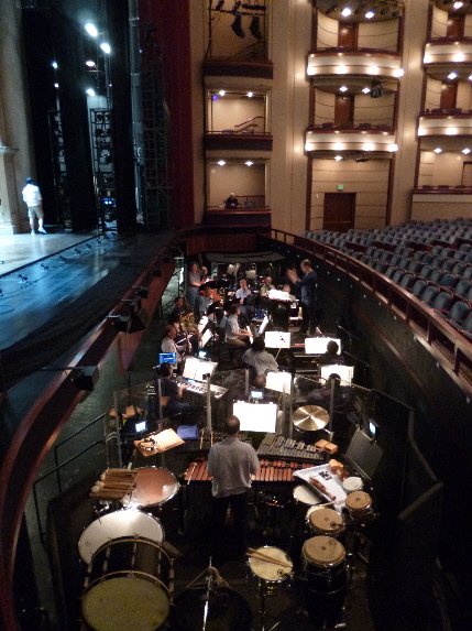 The pit band for Evita's opening at the Arsht Center practices during a sound check. / Staff photo