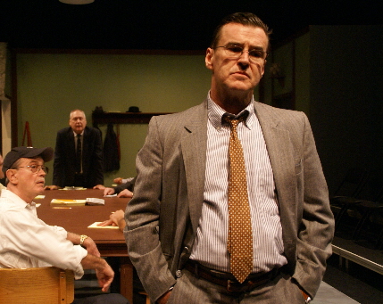 Hold out Juror #8 Clinton Archambault is watched warily by baseball fan Bill Schwartz and foreman Jerry Jensen in New Theatre's  Twelve Angry Men / Photo by Eileen Suarez