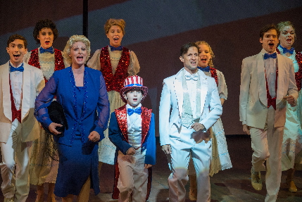 Scott Leiendecker in white as George M. Cohan leads the  cast in "You're A Grand Old Flag" in The Wick's George M / Photo by Richard Booth