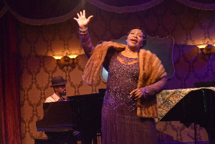 Avery Sommers as blues legend Bessie Smith holds forth with accompanist Elijah Taj Gee in Arts Garage's The Devil's Music / Photo by Alex Shapiro
